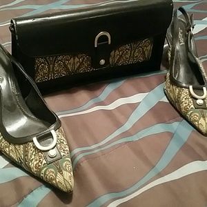 Shoes with matching clutch purse.